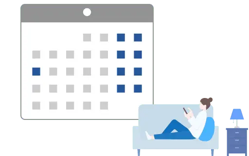 年間休日を表すカレンダーとソファーでくつろぐ人