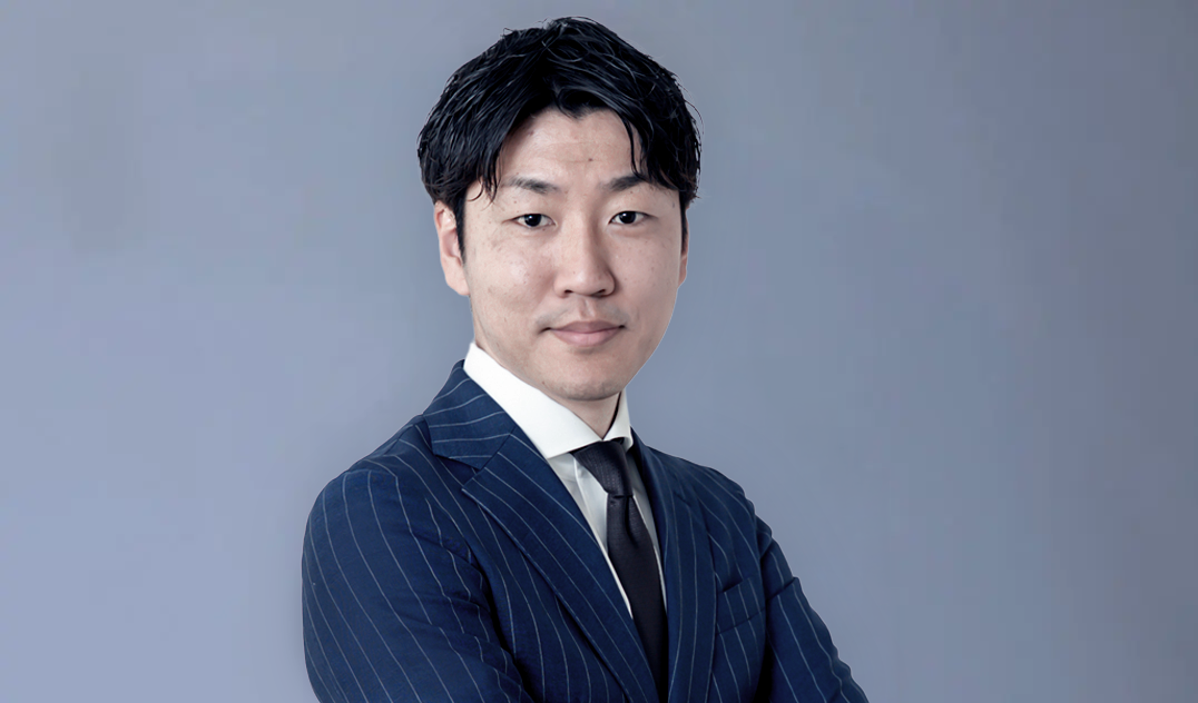 執行役員・採用部 部長 飯田 志賢